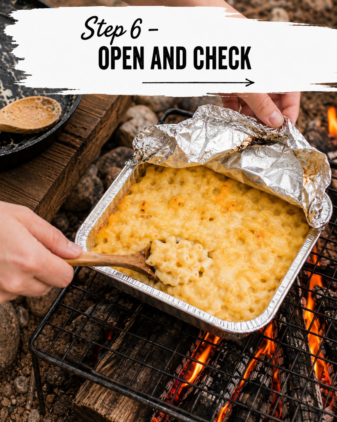 Peeling back the foil to check on campfire mac and cheese as it melts over the fire