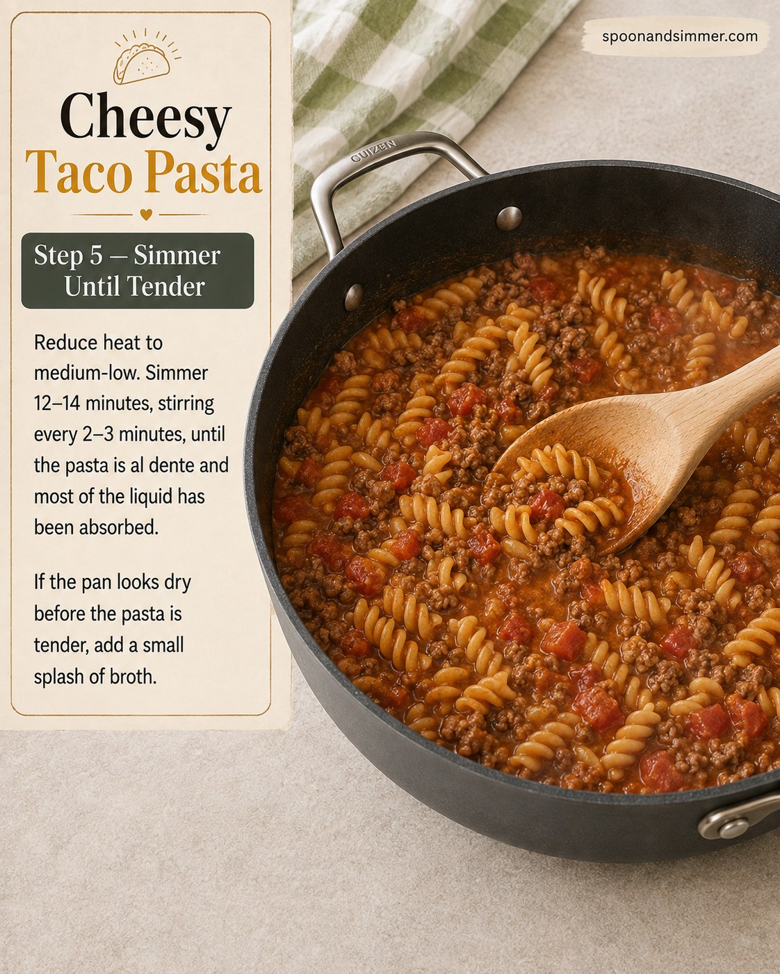 Cheesy taco pasta simmering in a skillet until the rotini turns tender