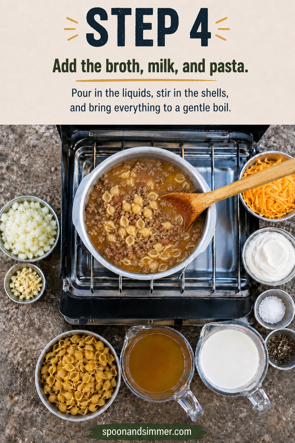 Broth, milk, and pasta shells poured into the pot to build one pot camping hamburger helper